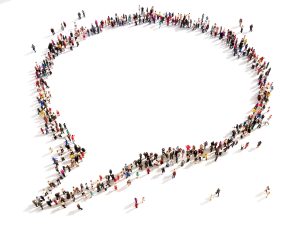 Kommentarblase von Menschen geformt - Draufsicht von weit weg